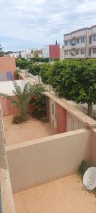 a view from the balcony of a building at Villa bien equiper a saidia pres de la plage in Saidia 