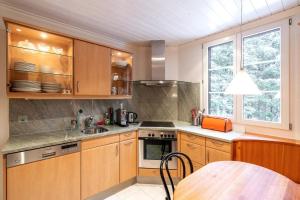 Kuchyň nebo kuchyňský kout v ubytování Chalet Surselva
