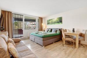 Postel nebo postele na pokoji v ubytování Ferienappartement Waldgenuss + 21 fotografií