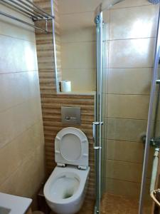 Koupelna v ubytování Mente Libre Villas + 27 fotografií