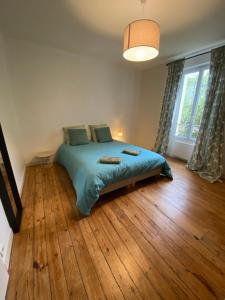 Postel nebo postele na pokoji v ubytování superbe appartement 4 pers. Crozon à 100 m de la plage de Morgat