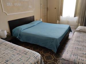 A bed or beds in a room at Al Duomo