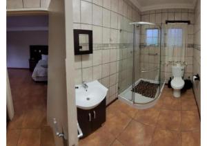 Vonios kambarys apgyvendinimo įstaigoje Mumo Resort