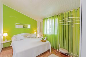 Posteľ alebo postele v izbe v ubytovaní Apartments Triporte