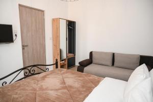 Postel nebo postele na pokoji v ubytování Gemilos Nest