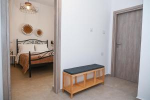Postel nebo postele na pokoji v ubytování Gemilos Nest