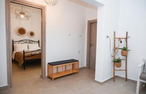 Postel nebo postele na pokoji v ubytování Gemilos Nest