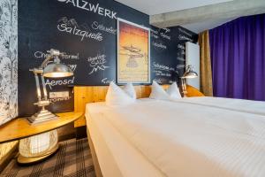 Voodi või voodid majutusasutuse SOLTHUS Hotel&SPA toas
