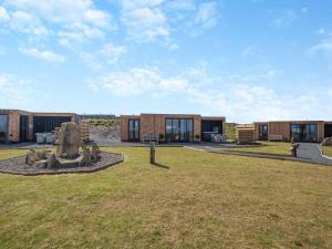 a building with a courtyard with a statue in the yard at Galloway Hills - Uk46817 in Wigtown