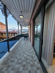 a balcony of a house with a view of the water at Centre Apartment in Gyumri