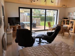 TV a/nebo společenská místnost v ubytování "Fewo-Ulla- 1" Ferienwohnung im EG