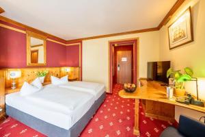 Postel nebo postele na pokoji v ubytování SOLTHUS Hotel&SPA + 37 fotografií