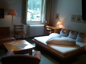 Postel nebo postele na pokoji v ubytování Berghotel Sonne + 11 fotografií