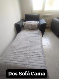 Ένα ή περισσότερα κρεβάτια σε δωμάτιο στο Las Victorias Bariloche