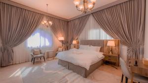 Ένα ή περισσότερα κρεβάτια σε δωμάτιο στο HOOUD Apartments
