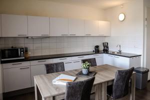 Kuchyň nebo kuchyňský kout v ubytování Strand Appartementen Wemeldinge