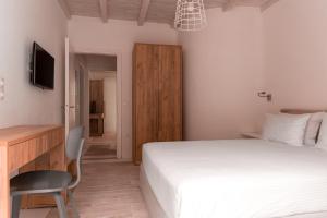 Senses Luxury Suites & Villas客房内的一张或多张床位