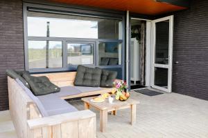 Posezení v ubytování Strand Appartementen Wemeldinge