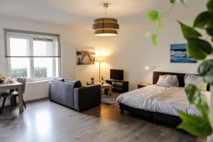 Postel nebo postele na pokoji v ubytování Strand Appartementen Wemeldinge