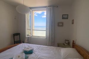 En eller flere senger på et rom på AL36 - Appartement vue mer exceptionnelle