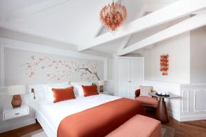 Postel nebo postele na pokoji v ubytování 2 Chesham Hotel