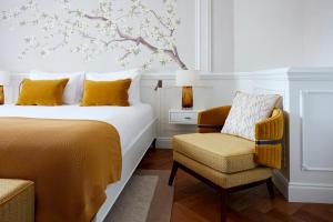 Postel nebo postele na pokoji v ubytování 2 Chesham Hotel