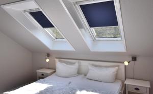 Ένα ή περισσότερα κρεβάτια σε δωμάτιο στο Alte Schule 1 +41 φωτογραφίες