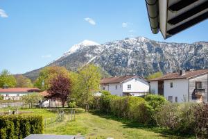 a view of a mountain from a house at Im Spatzennest in Inzell