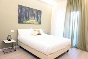 Postel nebo postele na pokoji v ubytování Toscana da aMare
