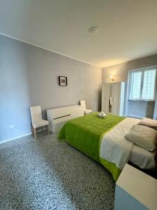 Postel nebo postele na pokoji v ubytování 4 Balconi rooms Paladini B&B e appartamenti