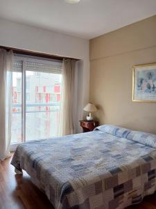 Ένα ή περισσότερα κρεβάτια σε δωμάτιο στο Departamento Manquelazo