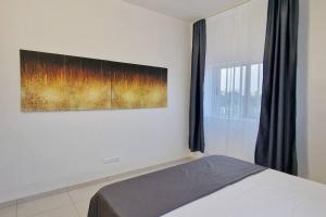 Postel nebo postele na pokoji v ubytování Casa D Oro