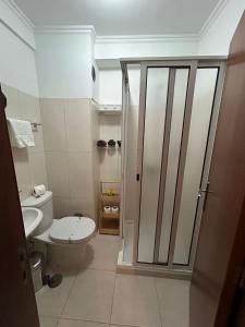 Ένα μπάνιο στο Palmar Rooms