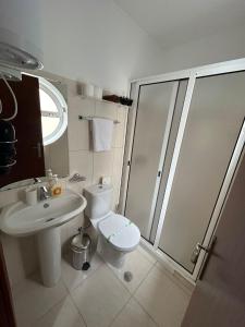 Koupelna v ubytování Palmar Rooms