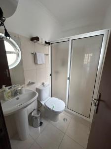 Koupelna v ubytování Palmar Rooms