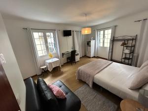 Postel nebo postele na pokoji v ubytování Palmar Rooms