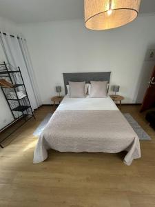 Postel nebo postele na pokoji v ubytování Palmar Rooms