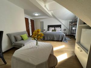 Postel nebo postele na pokoji v ubytování Palmar Rooms