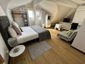 Postel nebo postele na pokoji v ubytování Palmar Rooms