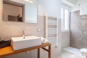 Koupelna v ubytování Malva Rooms + 37 fotografií
