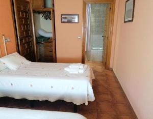 En eller flere senge i et værelse på Villa y Corte - Castro