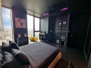 Postel nebo postele na pokoji v ubytování Skyline Solaria Milano