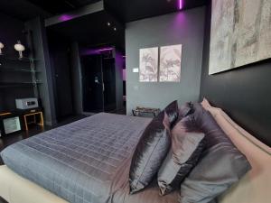 Postel nebo postele na pokoji v ubytování Skyline Solaria Milano