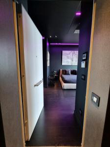 Postel nebo postele na pokoji v ubytování Skyline Solaria Milano