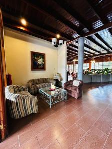 Predel za sedenje v nastanitvi Hotel Dos Rios