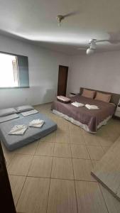 Кровать или кровати в номере Casa Amarela