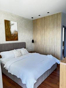 Postel nebo postele na pokoji v ubytování Luciano Hotel