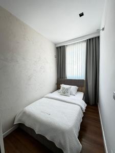 Postel nebo postele na pokoji v ubytování Luciano Hotel
