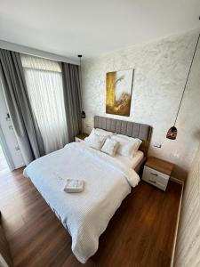 Postel nebo postele na pokoji v ubytování Luciano Hotel