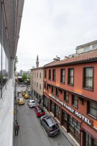 a view of a street with cars and buildings at Bursa Grand Family HOTEL in Bursa